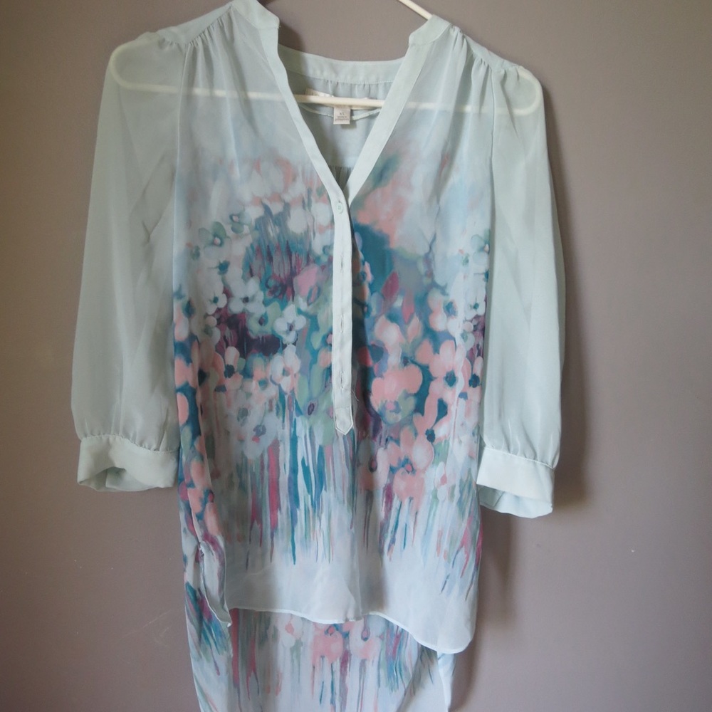 Light blue, pink, and dark blue sheer blouse